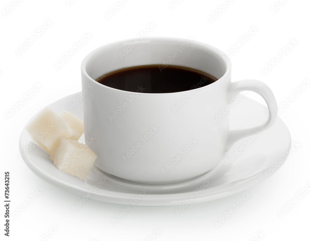 White cup of coffee with sugar pieces White cup of coffee with sugar pieces