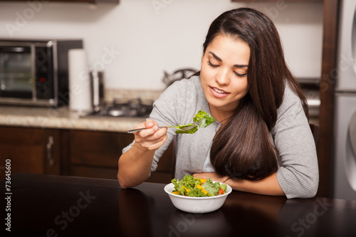 Eating a salad at home
