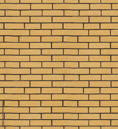 The texture of yellow brick cladding