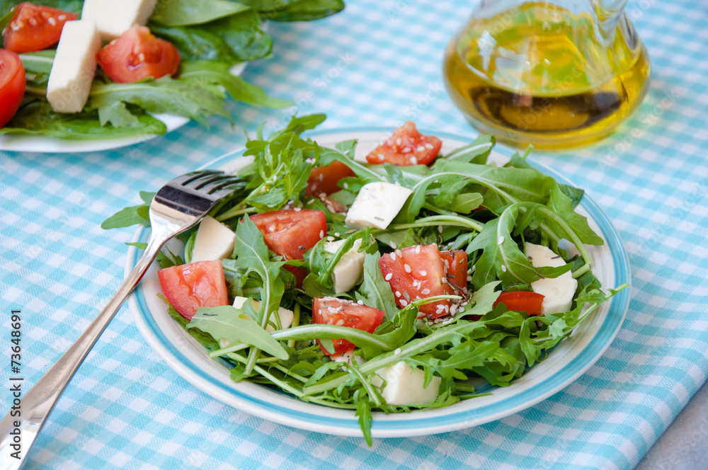 Greece salad with mozzarella, ruccola and tomatoes Greece salad with mozzarella, ruccola and tomatoes