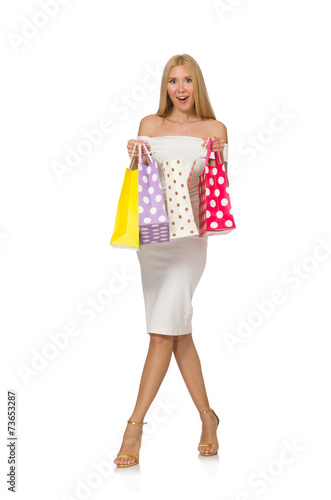 Woman with shopping bags isolated on white