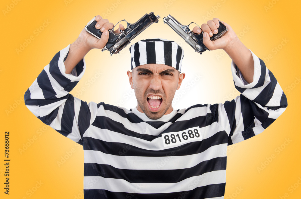 Prisoner with gun isolated on white Prisoner with gun isolated on white
