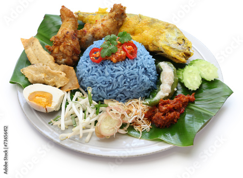 nasi kerabu, blue color rice salad, malaysian cuisine photo