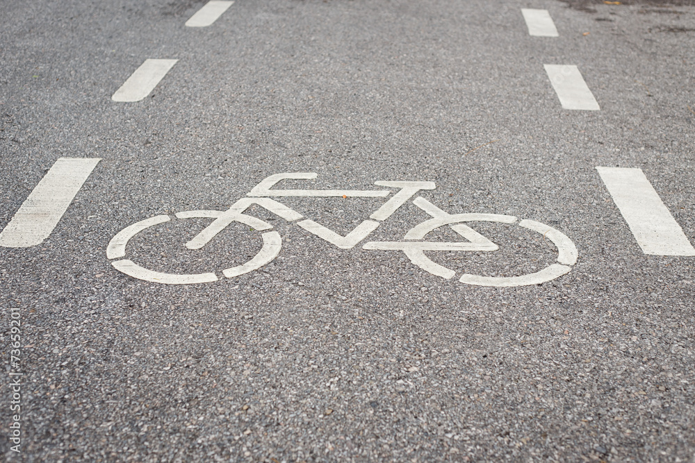 Bicycle sign or icon on the road in the park Bicycle sign or icon on the road in the park