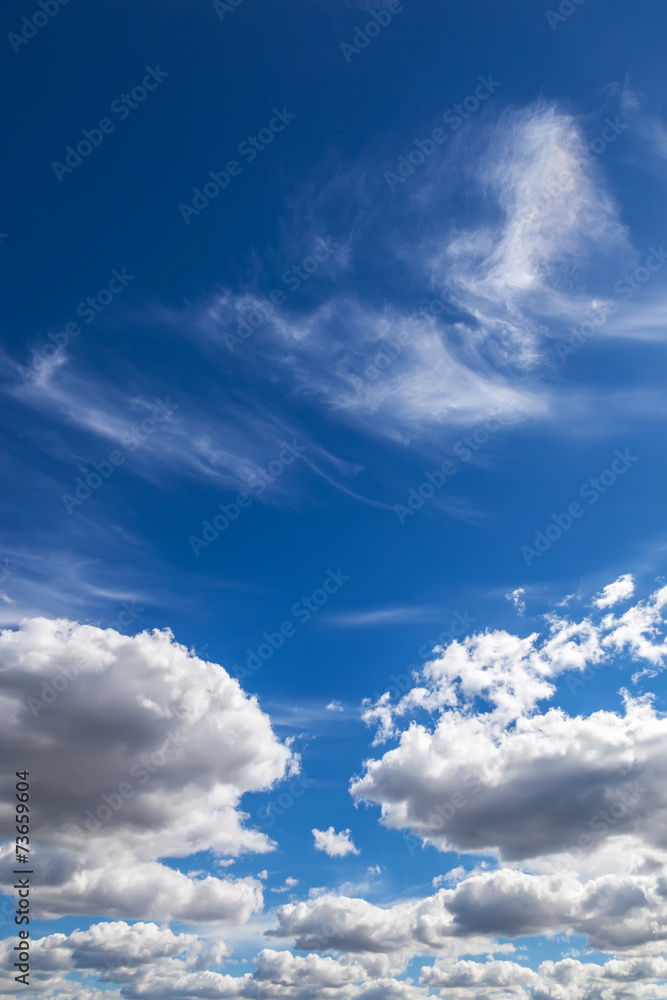 Obraz premium White clouds against blue sky.