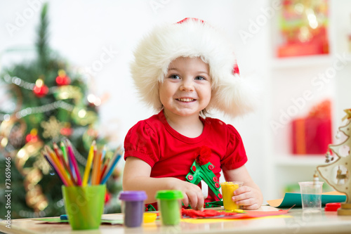 child making christmas tree...