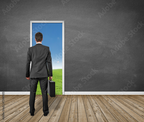 man standing in front of the door / EXIT / Landscape