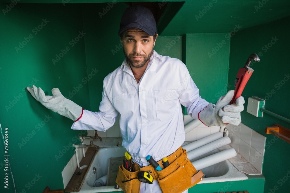 © WavebreakMediaMicro - Construction worker shrugging at camera