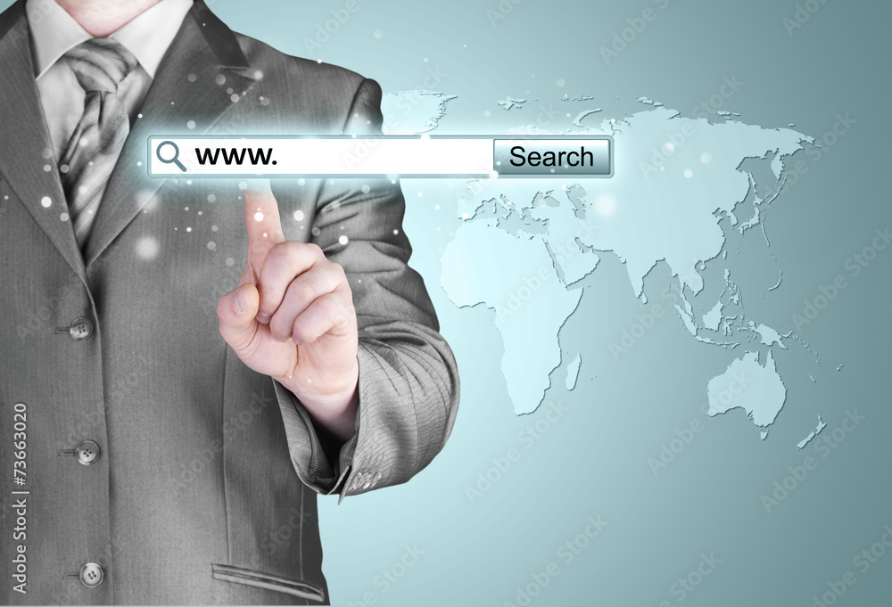 Businessman pushing virtual search bar Businessman pushing virtual search bar