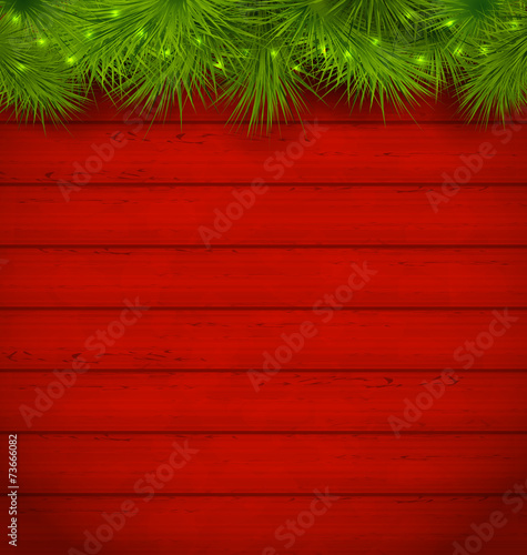 Christmas wooden background with fir twigs