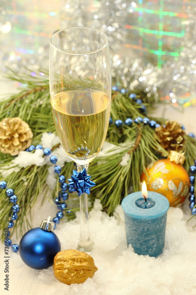Glass of champagne with christmas decoration Glass of champagne with christmas decoration