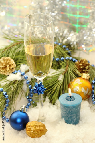Glass of champagne with christmas decoration