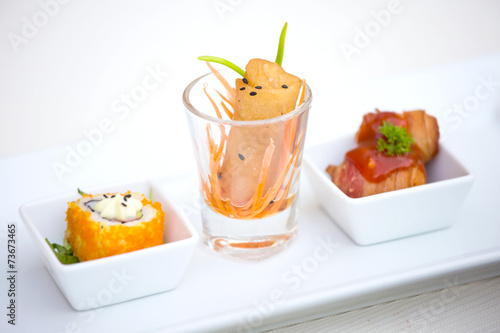 Set of Spring rolls - Sushi - Fried bacon with sausage