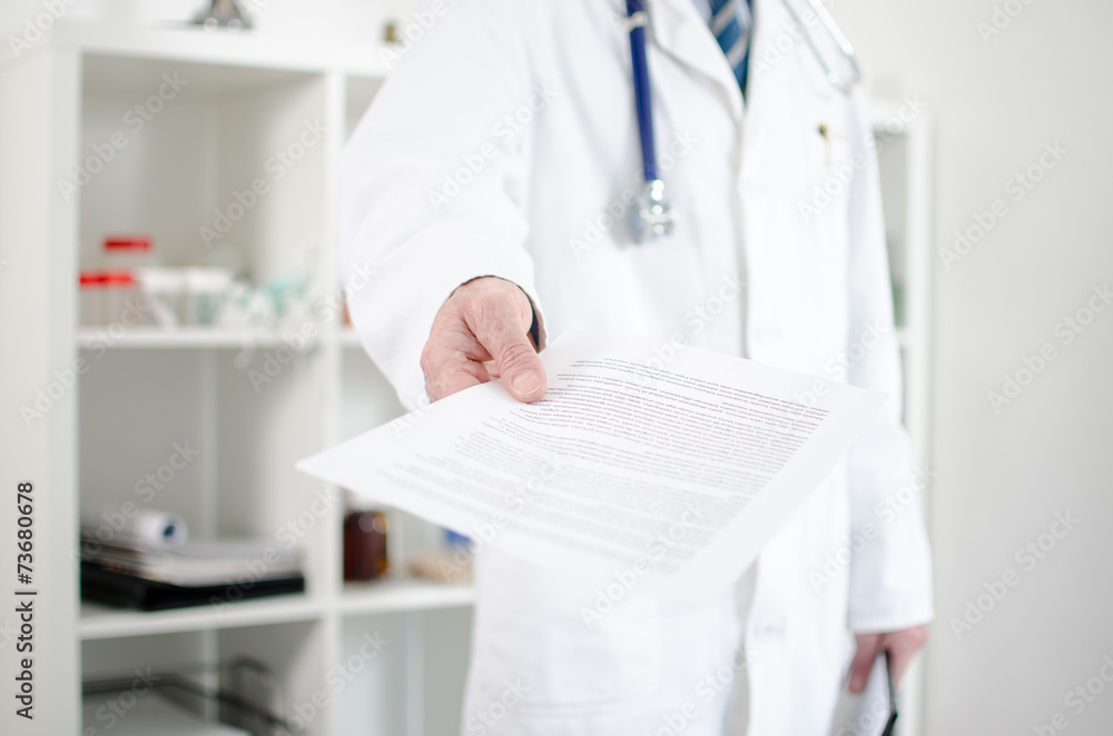 Doctor showing medical notes Doctor showing medical notes