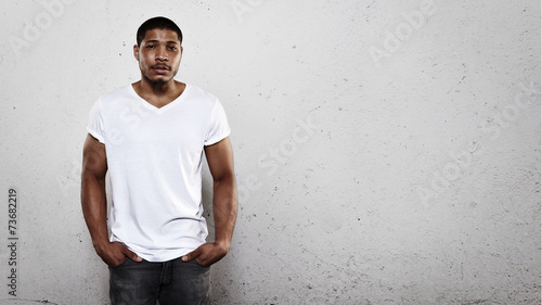 Portrait of a young man wearing white t-shirt