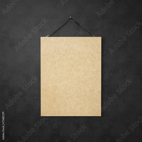 Kraft paper hanging on leather belt