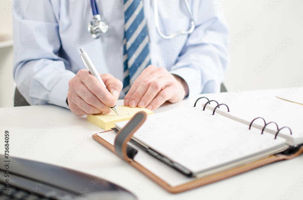 Doctor taking notes Doctor taking notes