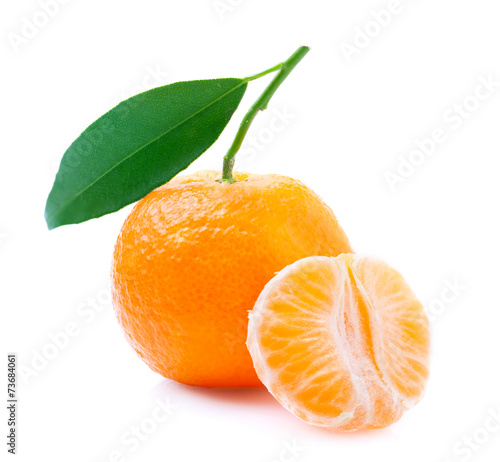 Ripe tangerine with leaf.