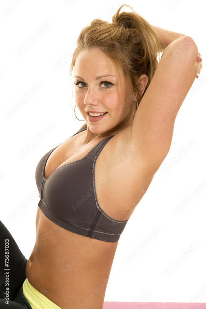 woman gray sports bra side arms up look and smile Stock Photo | Adobe Stock
