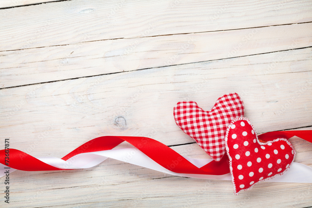 Obraz premium Valentines day background with hearts and ribbons