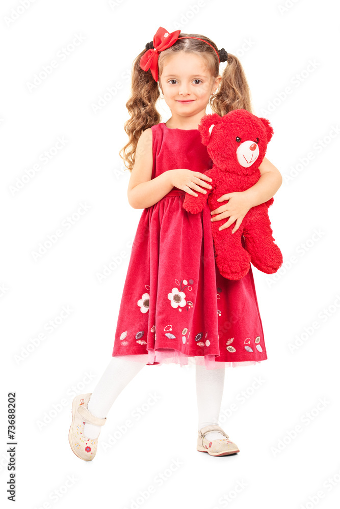 Cute little girl holding a red teddy bear Cute little girl holding a red teddy bear