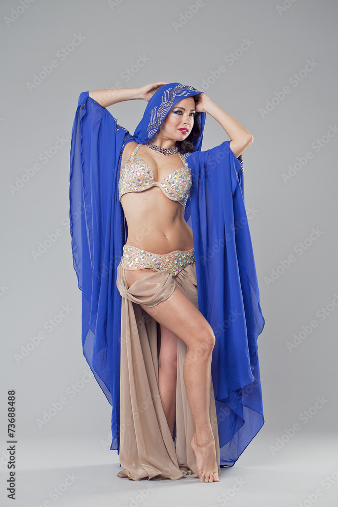 Portrait of the young sexy woman in blue tunic Arabic