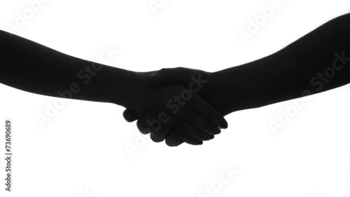 hand shake man and woman in silhouette