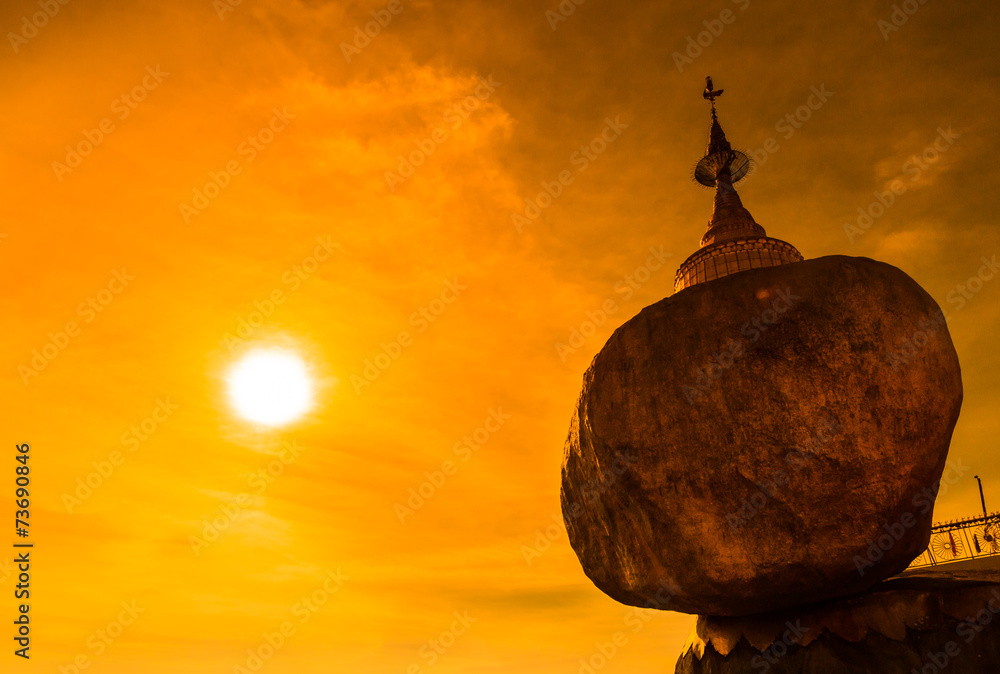 Golden rock called Kyaikhtiyo pagoda in the sunset, Myanmar