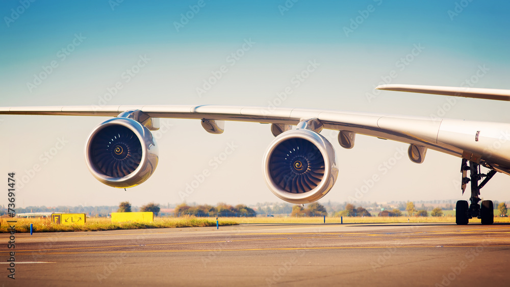 View on wing with two jet engines of Airbus A380 - obrazy, fototapety, plakaty 