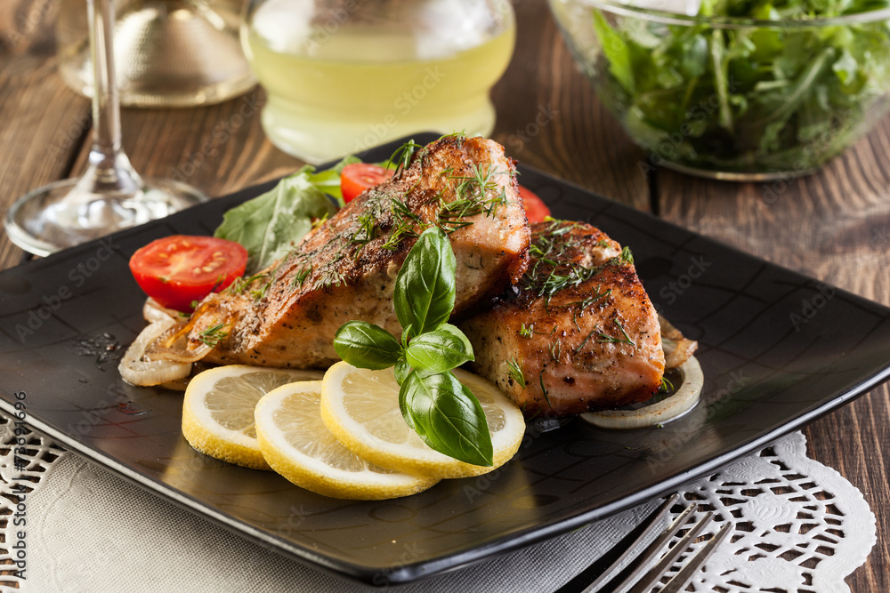 Fried salmon steak with vegetables Fried salmon steak with vegetables
