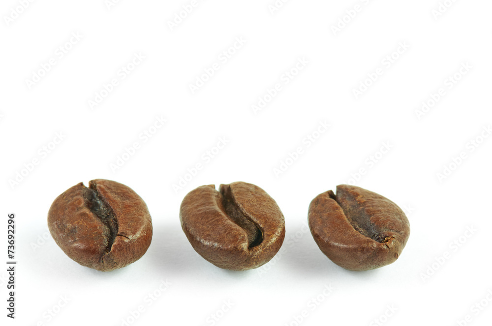 Coffee beans close up (isolated) Coffee beans close up (isolated)