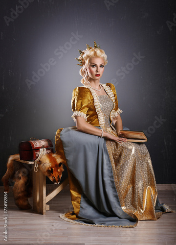 Picture of beautiful haughty queen in royal dress