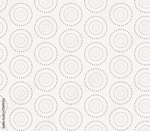 Seamless pattern with dotted circles. Vector repeating texture.