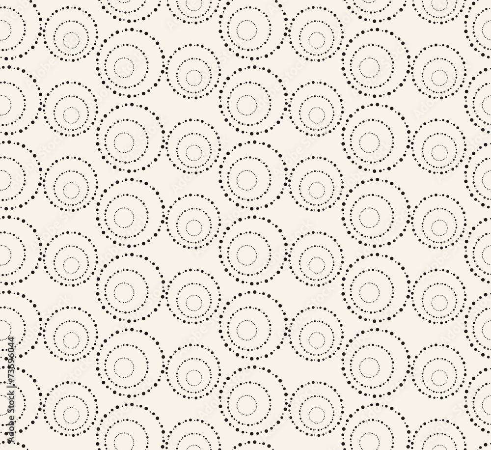 Seamless pattern with dotted circles. Vector repeating texture.