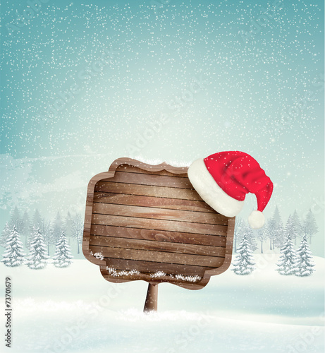 Winter christmas landscape with a wooden ornate sign and a santa