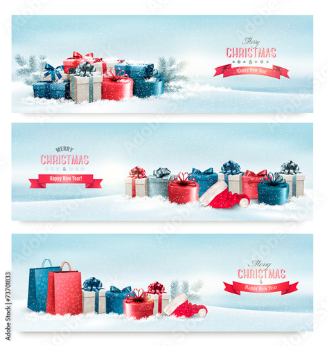 Three Christmas banners with presents. Vector.