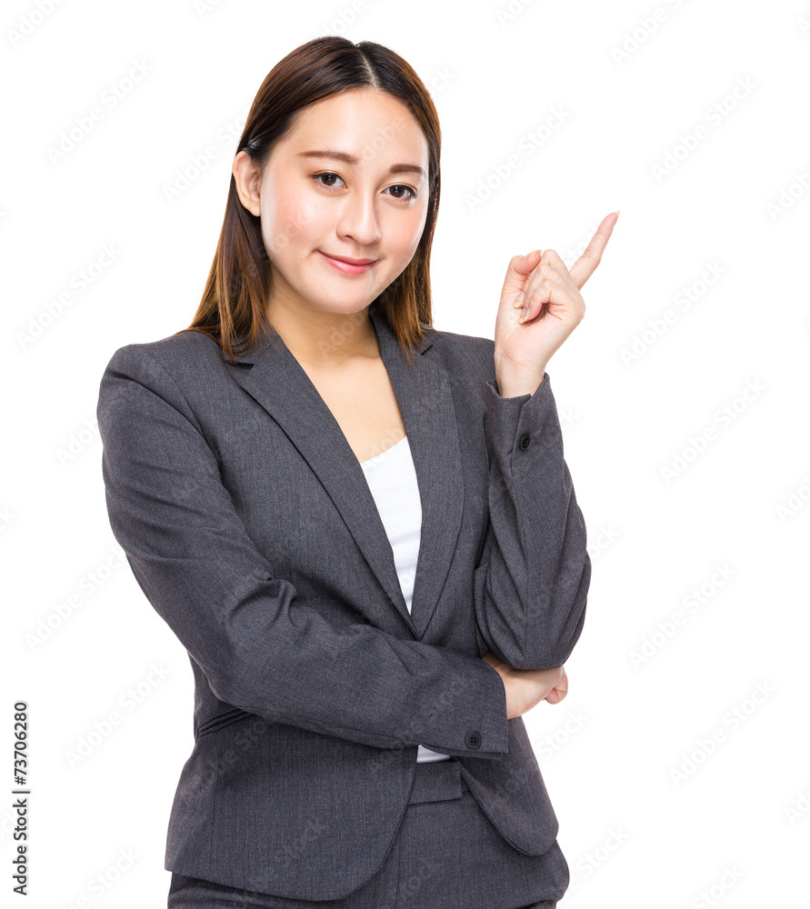 Asian businesswoman with finger point aside Asian businesswoman with finger point aside