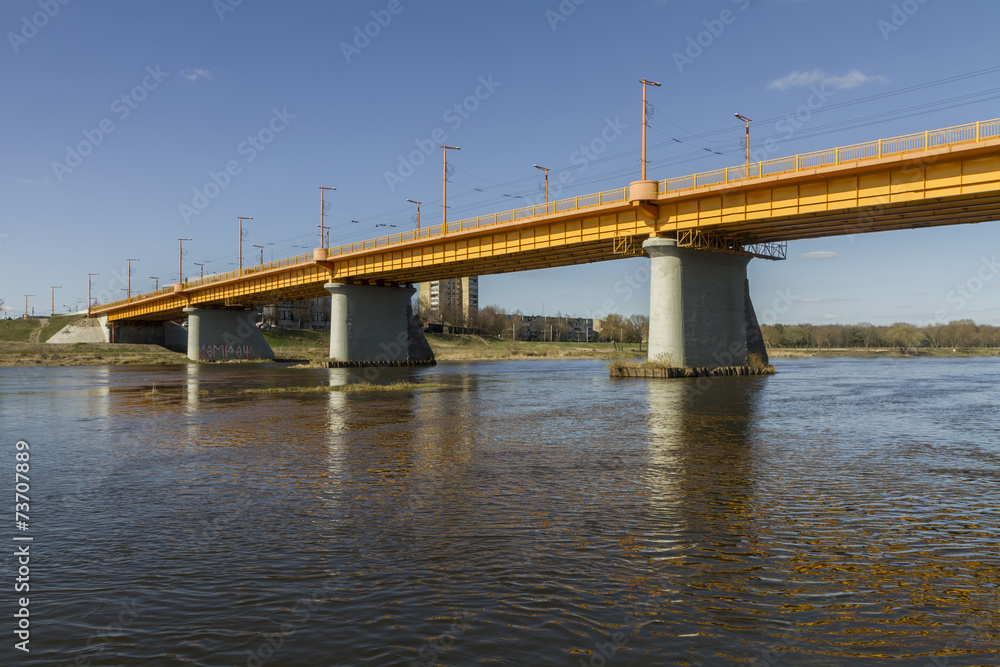 yellow bridge over the river