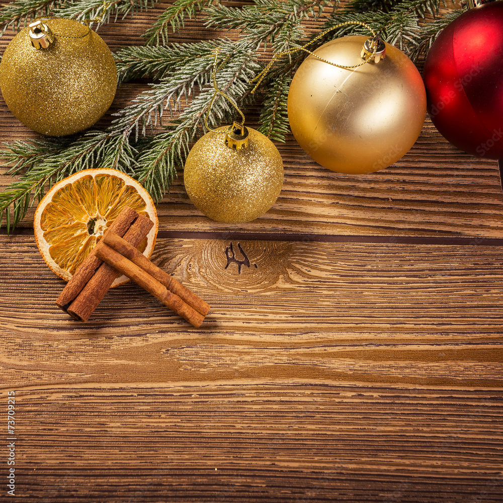 Christmas decoration, on wood background, gold christmas ball