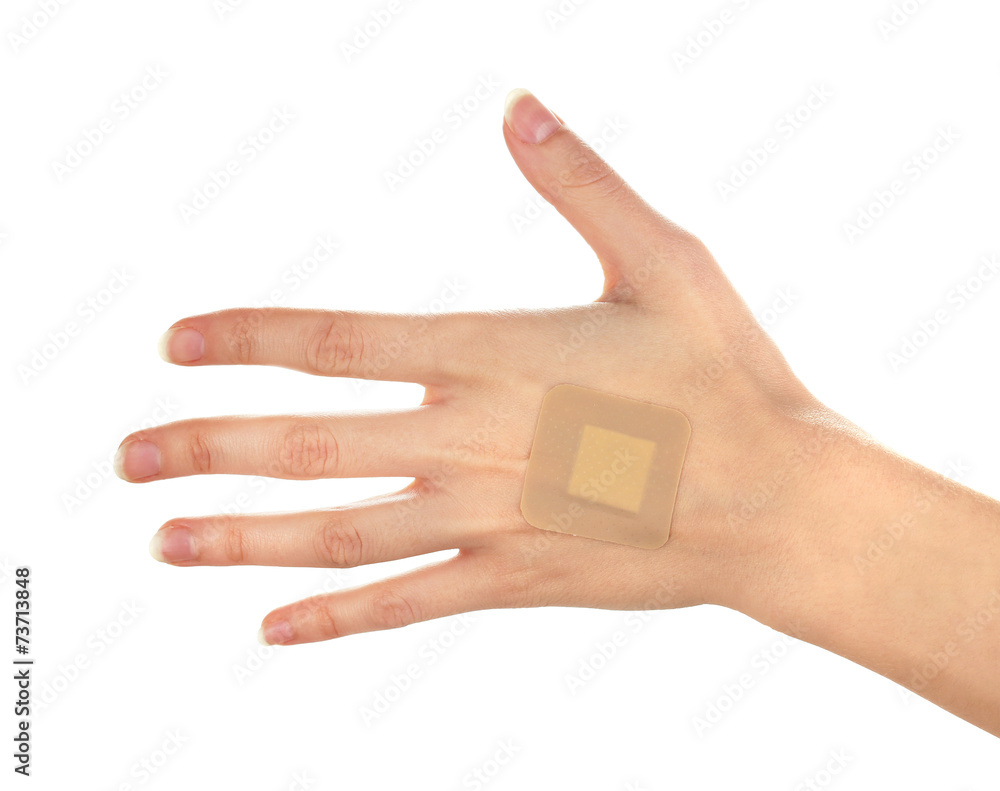 Wounded hand with plaster isolated on white Wounded hand with plaster isolated on white