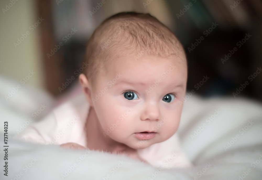 Surprised baby isolated on white