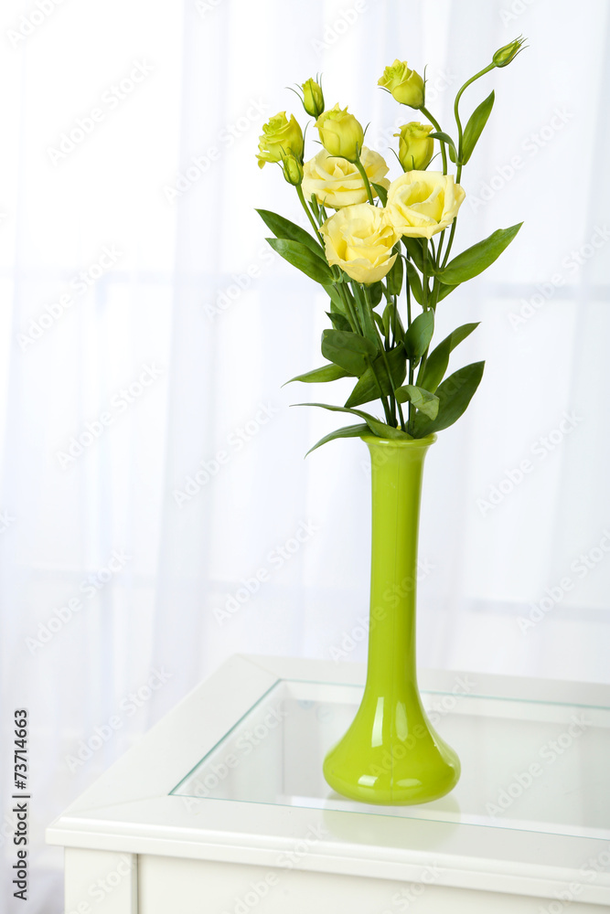 Beautiful bouquet of flowers in vase on window background Beautiful bouquet of flowers in vase on window background