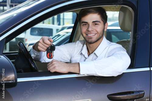 Young man in car