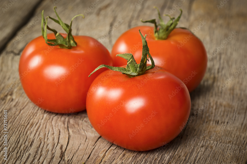 Three ripe tomatoes Three ripe tomatoes
