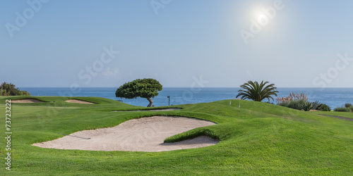 Panorama of a golf course on a sea background. for tourists.
