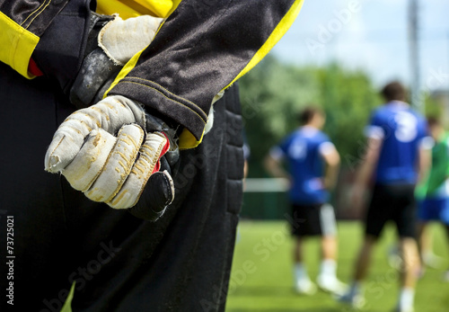 Silhouette goalkeeper at gate