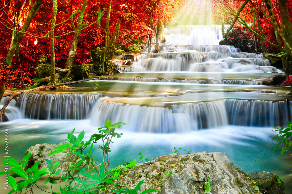 Beautiful waterfall in autumn forest