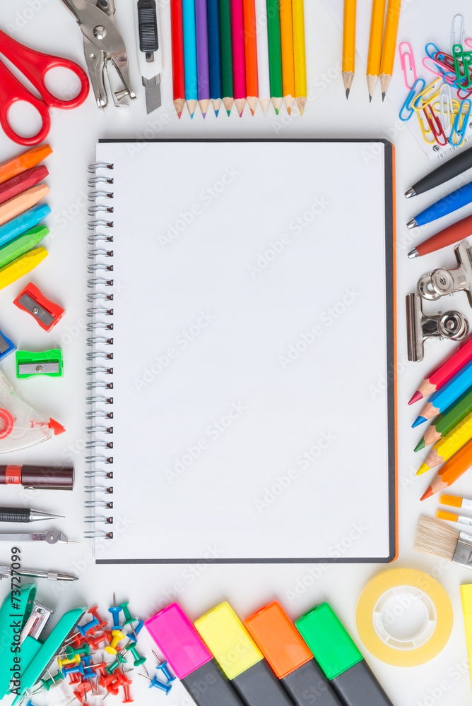 Blank notebook with colourful crayons Blank notebook with colourful crayons