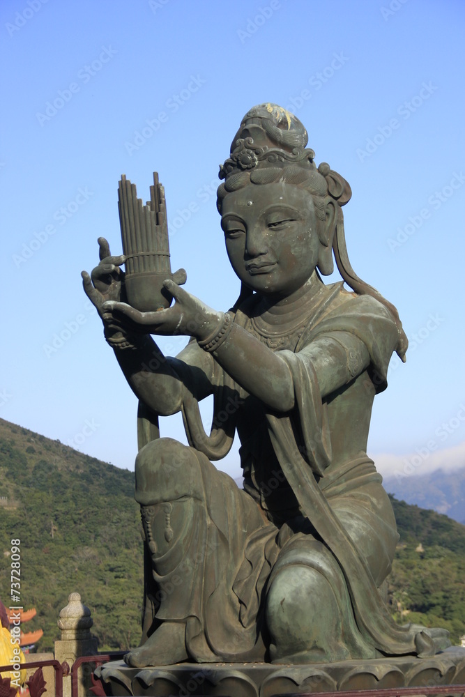 Obraz premium statue offrande à Bouddha
