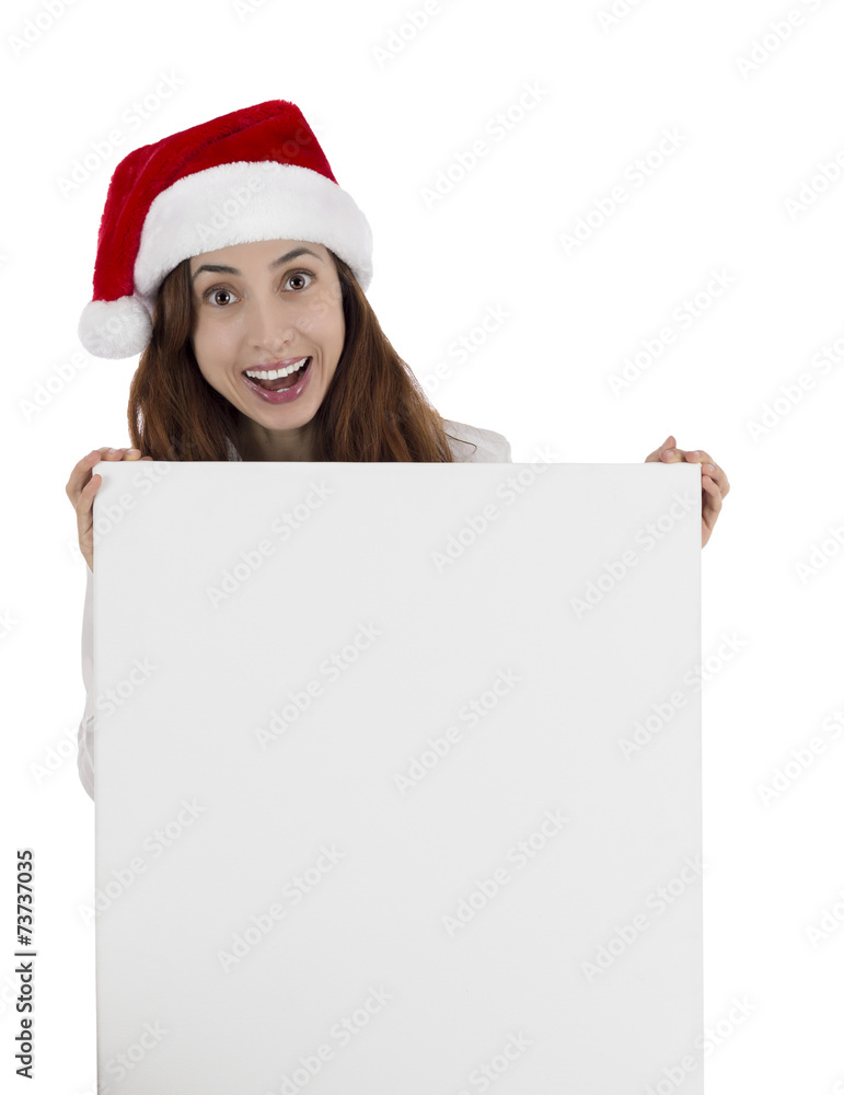 Christmas business woman showing a blank poster with a shocked e Christmas business woman showing a blank poster with a shocked e